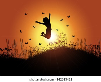 Silhouette of a woman jumping against a sunset background with grass and flowers