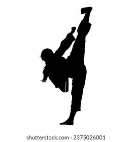 Silhouette of a woman kicking pose. Silhouette of a female martial art in action pose.