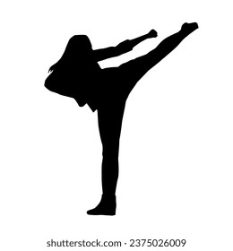 Silhouette of a woman kicking pose. Silhouette of a female martial art in action pose.