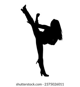 Silhouette of a woman kicking pose. Silhouette of a female martial art in action pose.