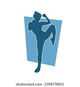 Silhouette of a woman kicking pose. Silhouette of a female martial art in action pose.