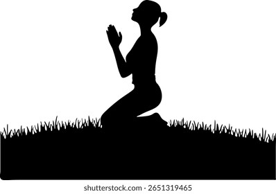 Silhouette of a woman kneeling in the grass with her hands clasped in prayer.