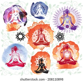 Silhouette of woman meditating in lotus position on round pattern