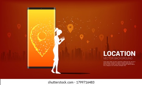 Silhouette of woman with mobile phone and GPS icon with city background. concept of location and facility place , GPS technology