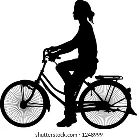 silhouette of woman on bicycle