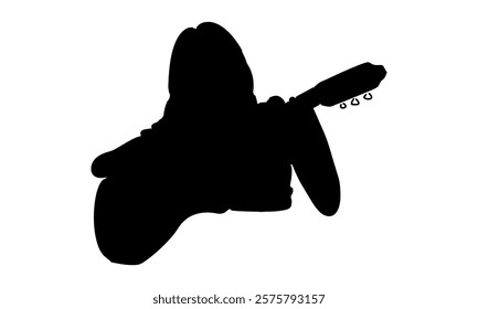 silhouette of woman playing acoustic guitar