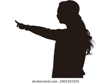 Silhouette of a woman pointing
