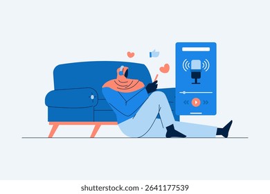Silhouette of a woman relaxing on a sofa while listening to a podcast using headphones