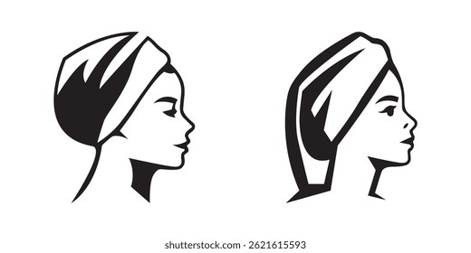 Silhouette of woman using hair towel after bath