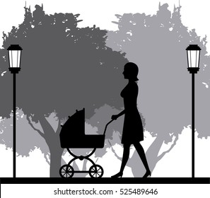 silhouette woman walking with pram baby in park