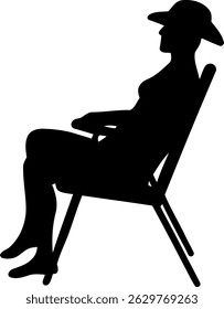 Silhouette of a Woman Wearing a Hat Relaxing in a Beach Chair