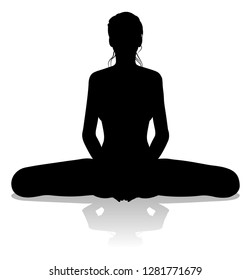 A silhouette of a woman in a yoga or pilates pose 