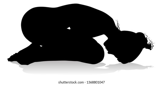 A silhouette of a woman in a yoga or pilates pose 