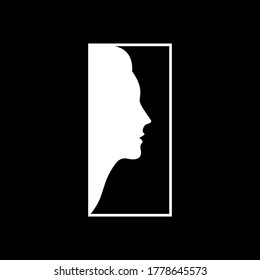 Silhouette of a woman's face in a frame. Abstract logo concept. Vector illustration.
