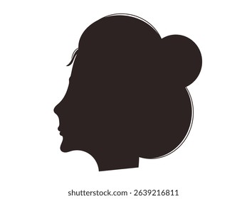 Silhouette of a Woman's Head with a Voluminous Hair Bun.