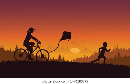 silhouette women cycling and a boy flying a kite.