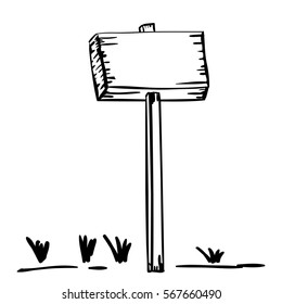 silhouette wooden placard with stake and grass