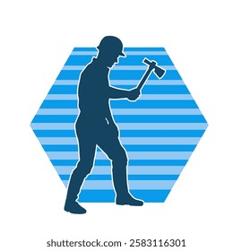 Silhouette of a worker in action pose using his axe tool.