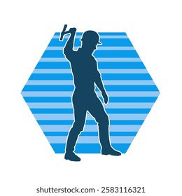 Silhouette of a worker in action pose using his axe tool.