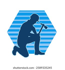 Silhouette of a worker in action pose using his axe tool.