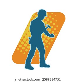 Silhouette of a worker carrying hammer tool. Silhouette of a worker in action pose using hammer tool.