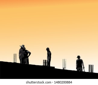 Silhouette of worker team standing on construction site