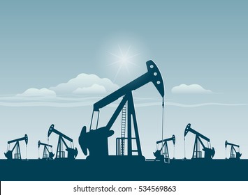 silhouette of working oil pumps , oil industry equipment