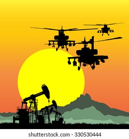 silhouette of working oil pumps on sunset background