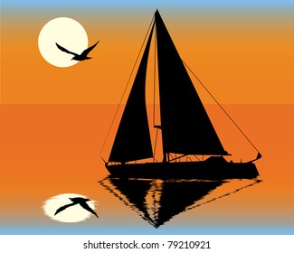 silhouette of a yacht  on the background of the setting sun