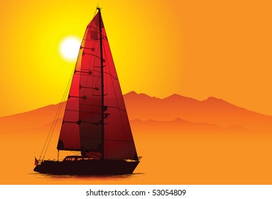 Silhouette of yacht under sail at sunset