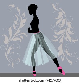 Silhouette of a young ballerina in profile