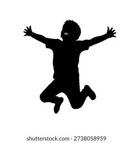 Silhouette of a young boy jumping with outstretched arms and legs, conveying joy and freedom.