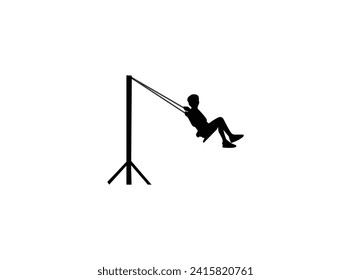 Silhouette young boy on swings sideways. Young boy swings sideways silhouette.