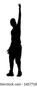 Silhouette of a young boy with one arm up in the air