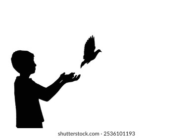 Silhouette of a young boy releasing a bird, symbolizing freedom, hope, spirituality, self-expression and letting go. This image captures the essence of liberation and new beginnings.