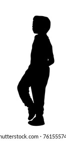 Silhouette of a young boy standing