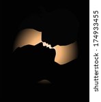 Silhouette of a young couple on a dark background