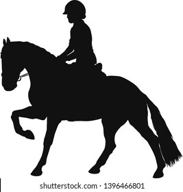 Silhouette of a young horsewoman galloping on a pony
