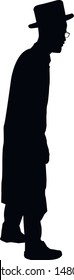 Silhouette of a young Jewish man in a hat. Religious Jews in a traditional costume. Hasid with sidelocks near the wall. Isolated vector illustration. Black on white.