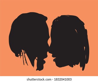 Silhouette of young kissing couple