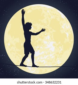 Silhouette Of Young Muscular Man Walking On The Tight Rope With His Hands Lifted In Front Of The Bright Full Moon In A Dark Starry Night.