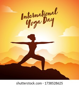 Silhouette of Young Woman Practicing Virabhadrasana Pose At Sunrise on Mountain View for International Yoga Day.