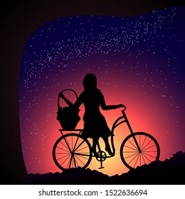 Silhouette of a young woman sitting on a bicycle, holding a basket of flowers and looking at the starry sky