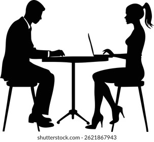 Silhouetted man and woman sit across from each other at a table using a laptop, both dressed professionally and concentrating on their computer.