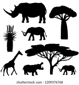 silhouettes of african animals and trees