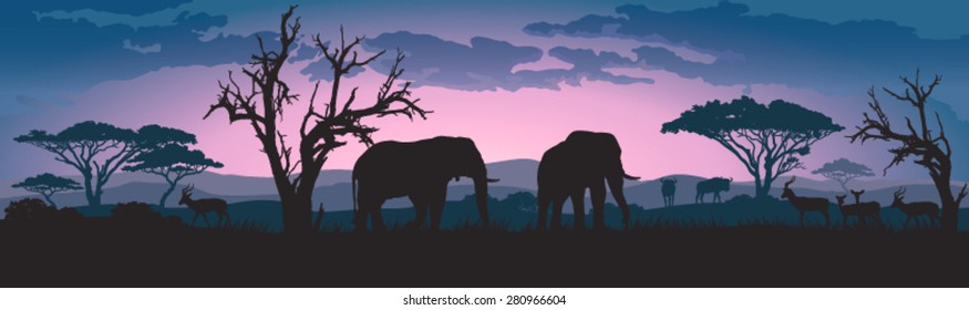 Silhouettes of african wild elephants and other animals at sunset or sunrise 