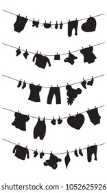 Silhouettes of baby clothes and toys on a romp