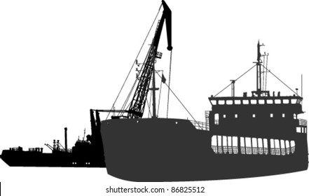 Silhouettes of the barge and the floating crane