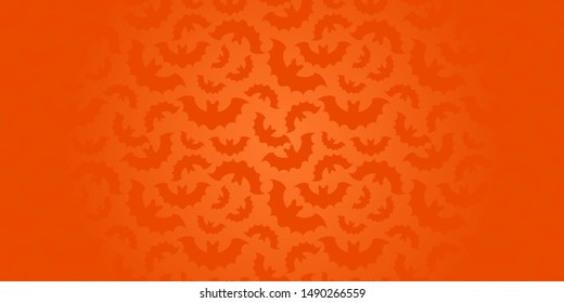 Silhouettes of bats on orange background. Halloween background