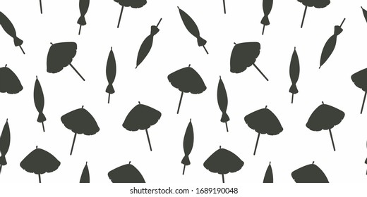 Silhouettes of beach umbrellas, geometric seamless pattern on a white background, vector. Background for printing on textiles, wrapping paper, wallpaper.